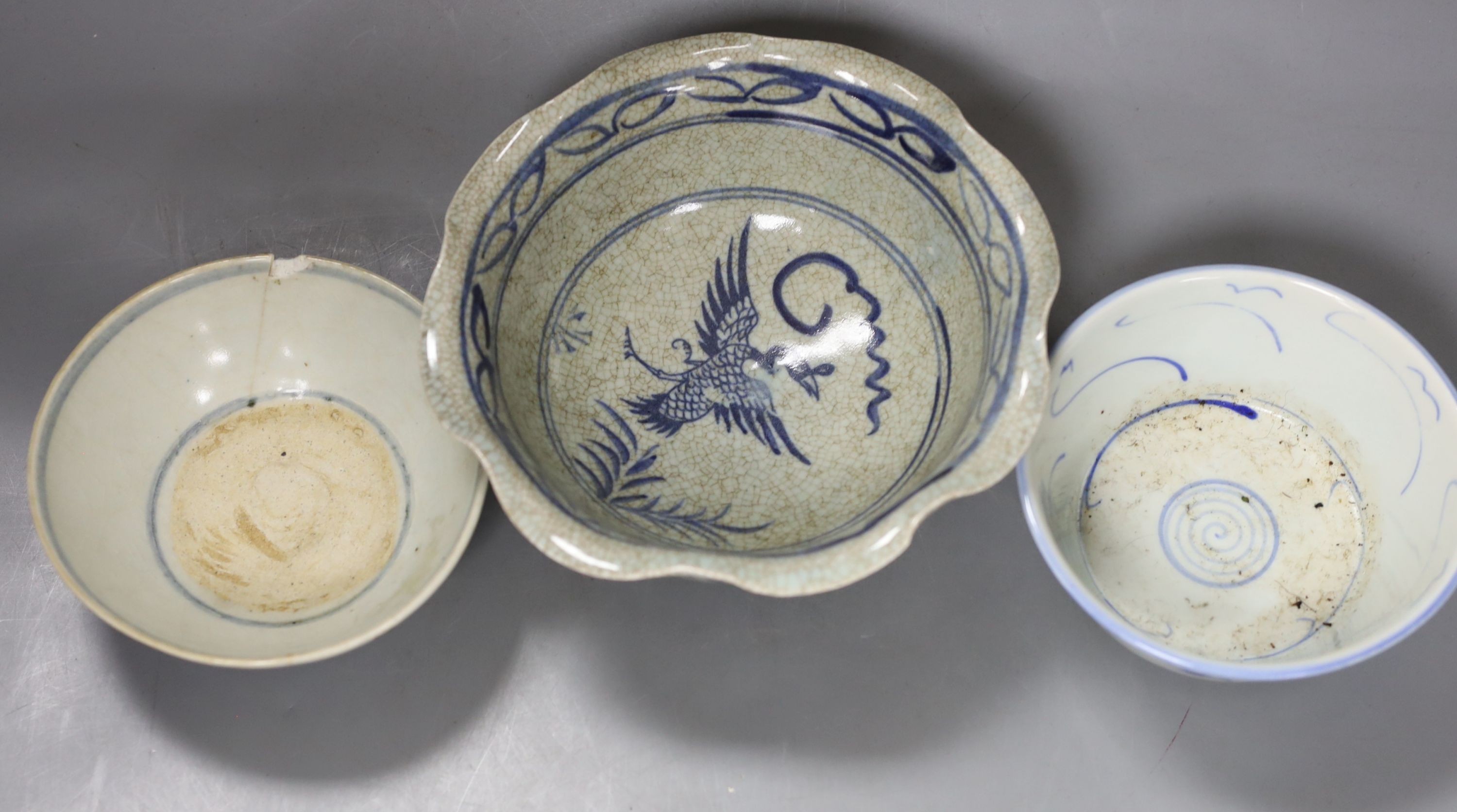 Three Chinese porcelain blue and white bowls, largest 17cm. diam.